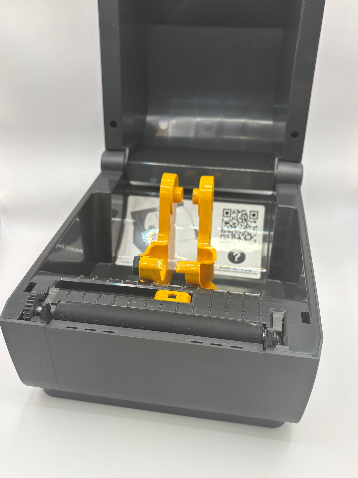 Zebra ZD230 label printer showing easy media loading design