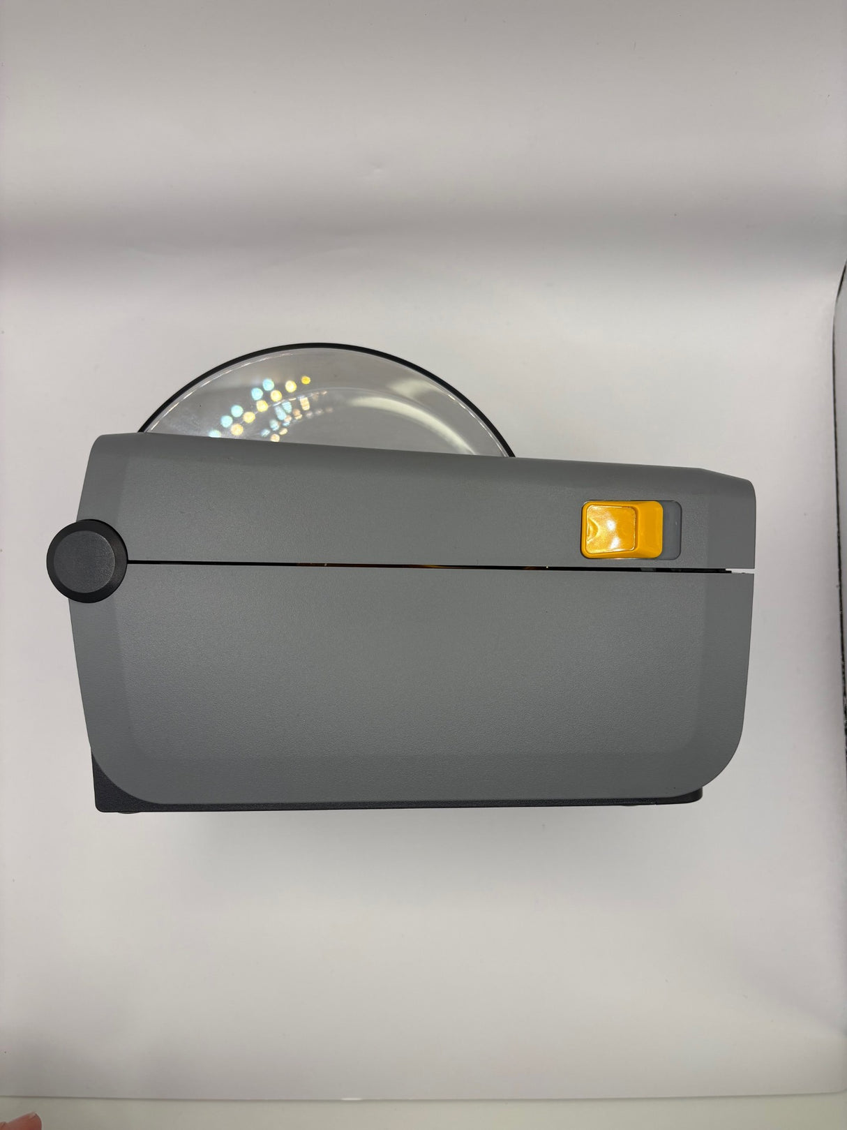 Compact Zebra ZD410 desktop label printer ideal for retail and workspace setups