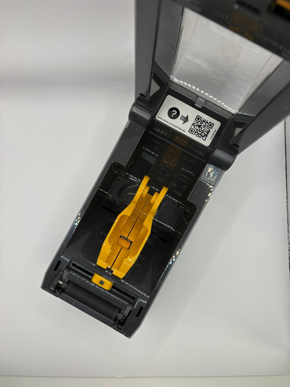 Zebra ZD410 printer open cover showing easy media loading for labels