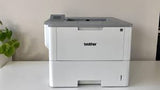 Brother HL-L6400DW business laser printer with touchscreen display