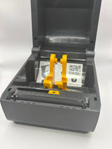 Zebra ZD230 label printer showing easy media loading design