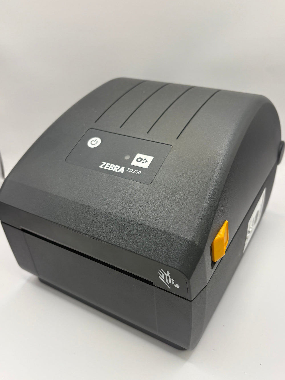 Front View of a Zebra ZD230 Thermal Label Printer for Office Use