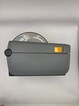 Compact Zebra ZD410 desktop label printer ideal for retail and workspace setups